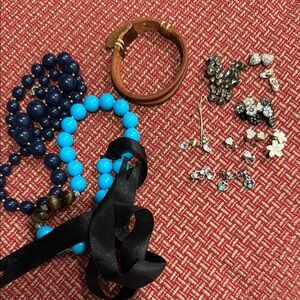2 necklaces, 1 bracelet, 10 earrings